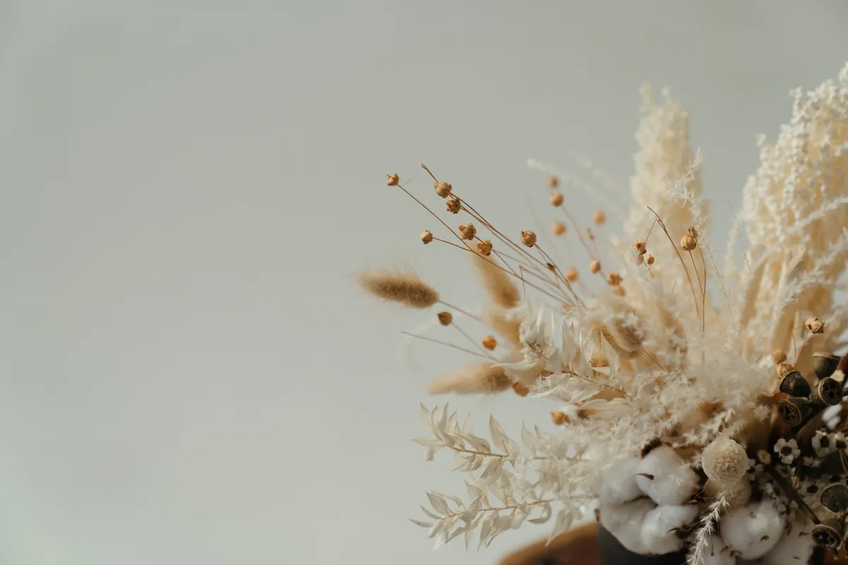 Dried flower arrangement in soft neutral tones